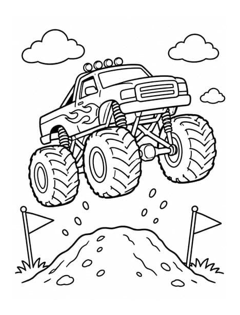 Monster truck jumping over a dirt hill